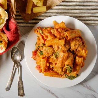 Rigatoni with a creamy vodka sauce with sausage and spinach.