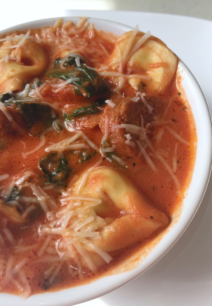 Creamy tortellini soup with sausage and spinach.