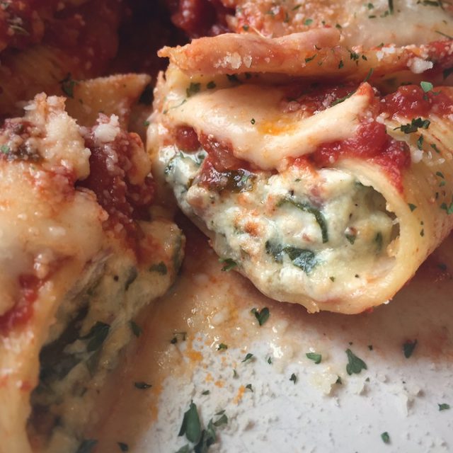 Stuffed shells with spinach and pancetta.