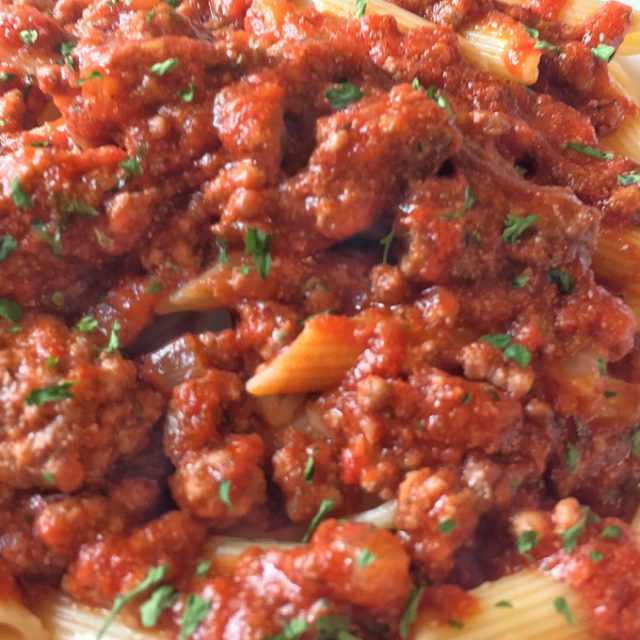 Penne with ragu al bolognese.