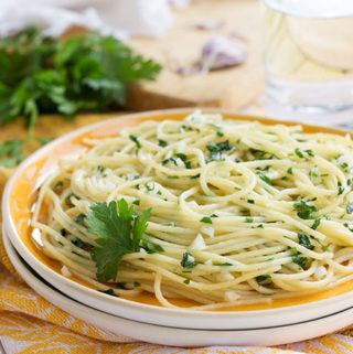 Italian pasta with garlic, extra virgin olive oil, and parsley