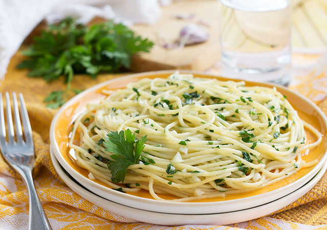 Italian pasta with garlic, extra virgin olive oil, and parsley