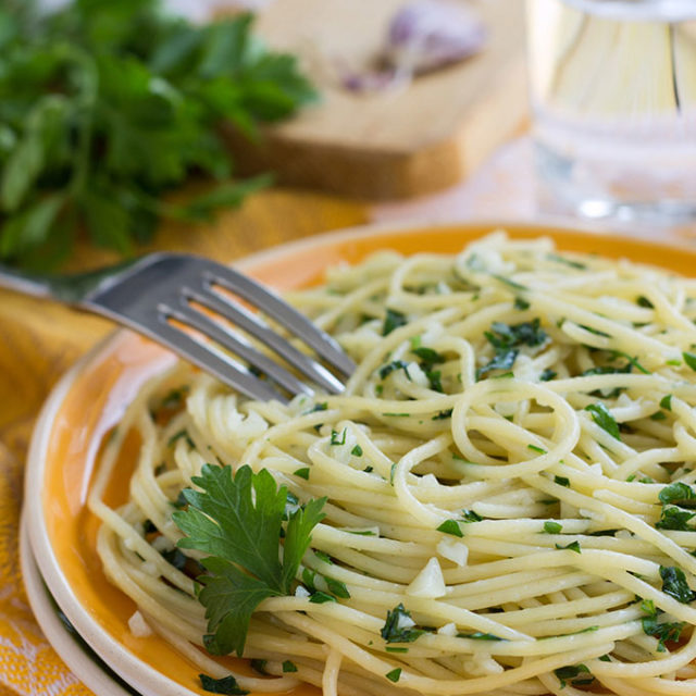 Italian pasta with garlic, extra virgin olive oil, and parsley