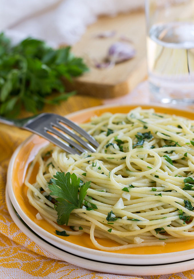 Italian pasta with garlic, extra virgin olive oil, and parsley