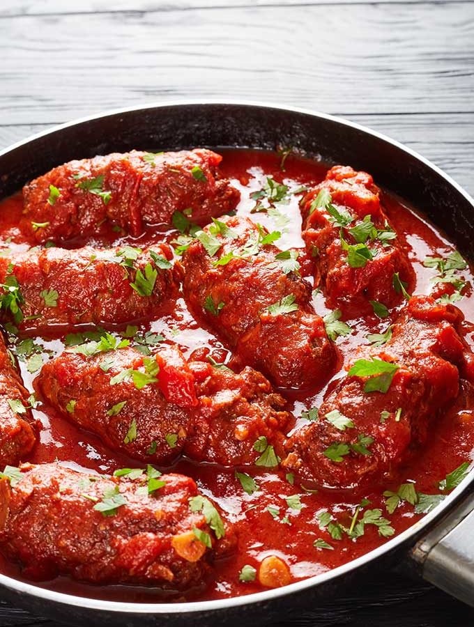 Beef braciole in marinara sauce.